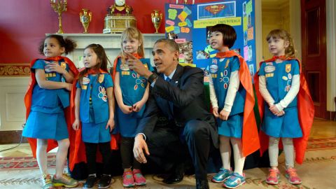 Obama poses with girl scouts from Tulsa, Oklahoma during the 2015 White House Science Fair March 23, 2015 in Washington, DC.
