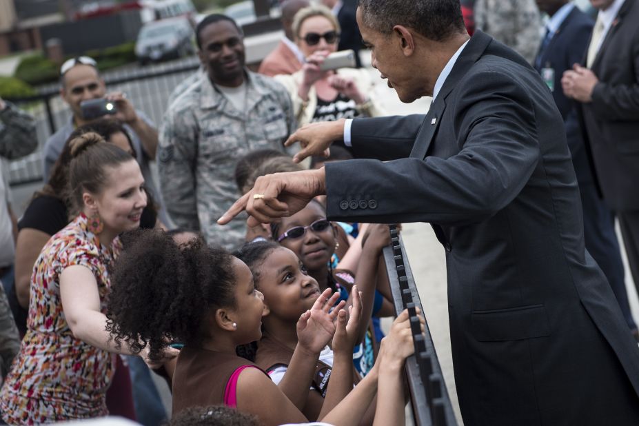 Obama greets Girl Scouts in Maryland in May 2014.