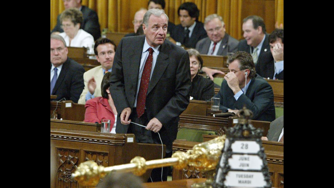 Then-Canadian Prime Minister Paul Martin stands to vote in the House of Commons in Ottawa to pass the same sex marriage bill in June, 2005.