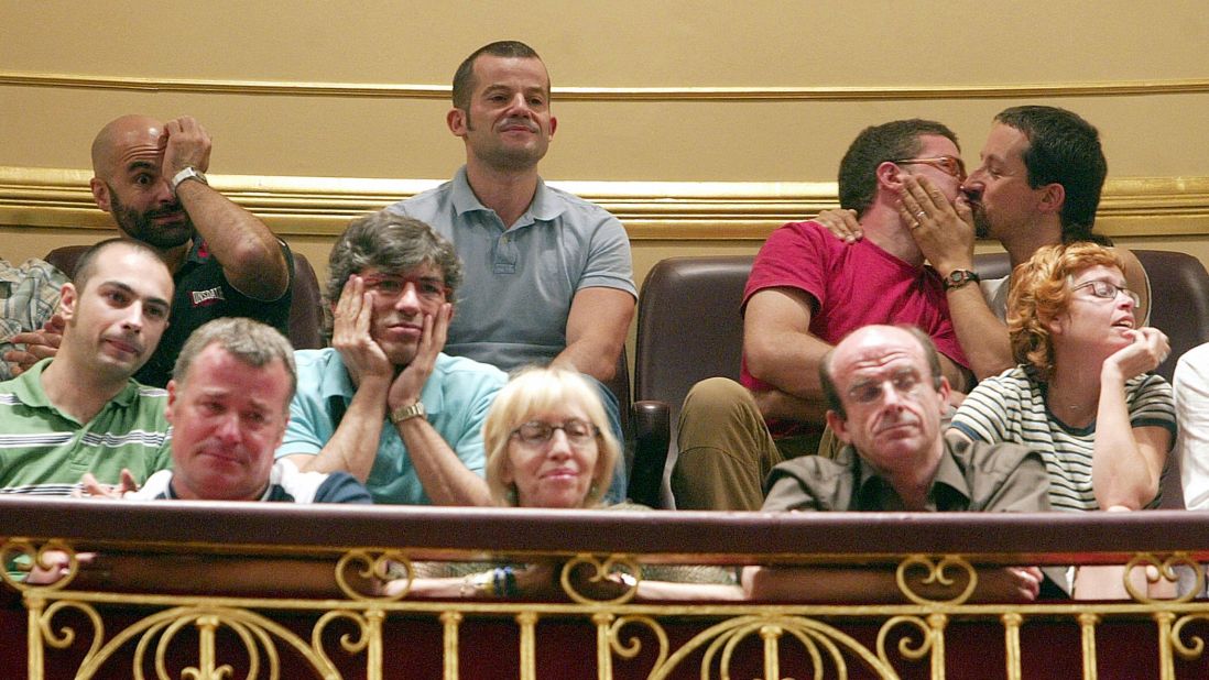 People in Madrid, Spain react to a law allowing same-sex couples to marry and adopt children in Spain in June, 2005.