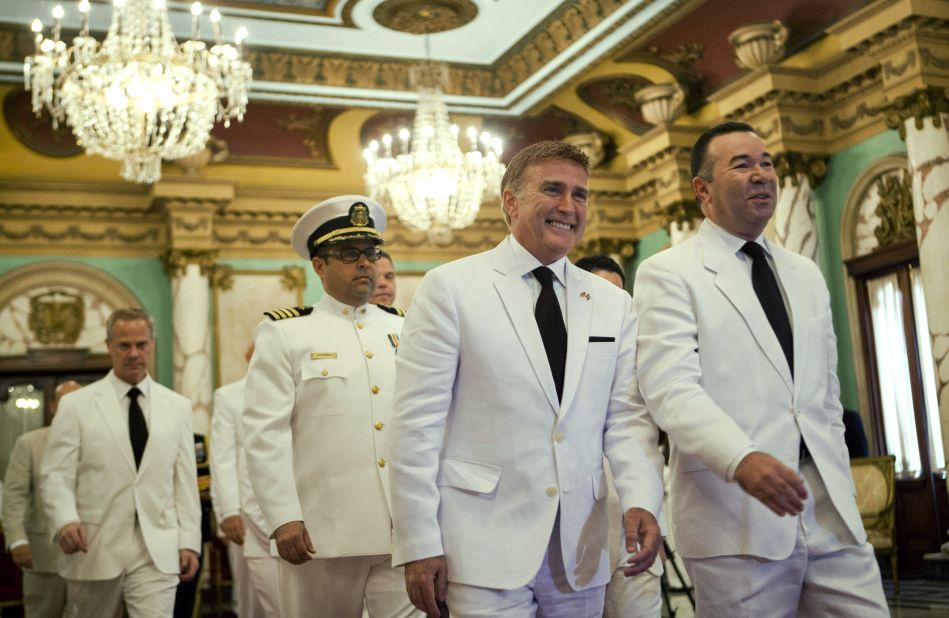 U.S. Ambassador to the Dominican Republic and gay rights activist James Brewster, center, arrives to present his credentials to Dominican President Danilo Medina in December, 2013, during a ceremony at the National Palace in Santo Domingo.