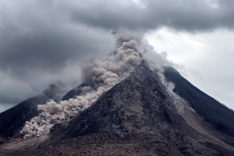 Thick ash, rock fragments and volcanic gases pour from <a href="http://ireport.cnn.com/docs/DOC-1246978">Mount Sinabung</a> in Indonesia. The government's natural disaster management agency raised the alert level on June 5, 2015.