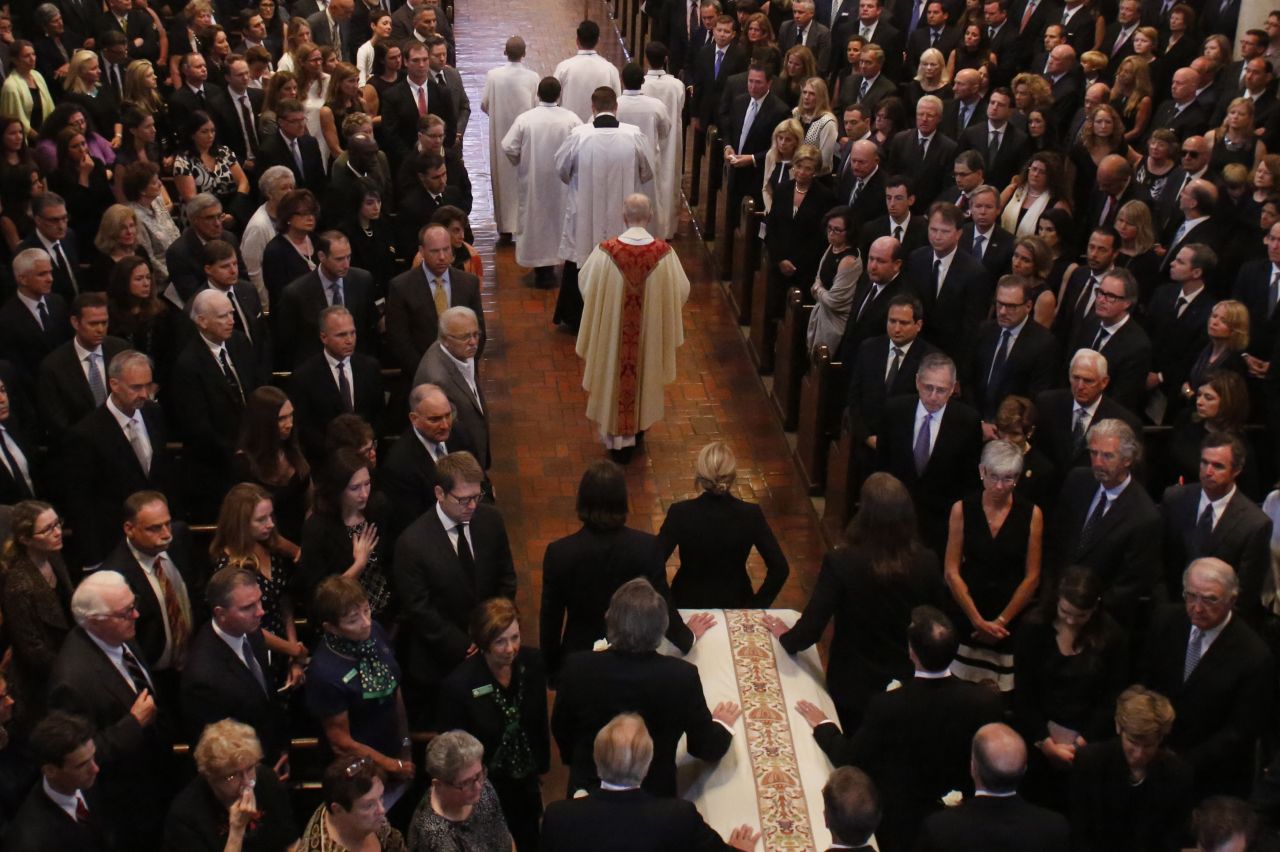 A procession carrying the casket of Beau Biden enters the church on June 6. 