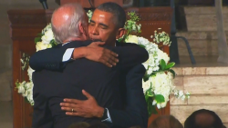 obama hugs kisses biden after eulogy beau biden