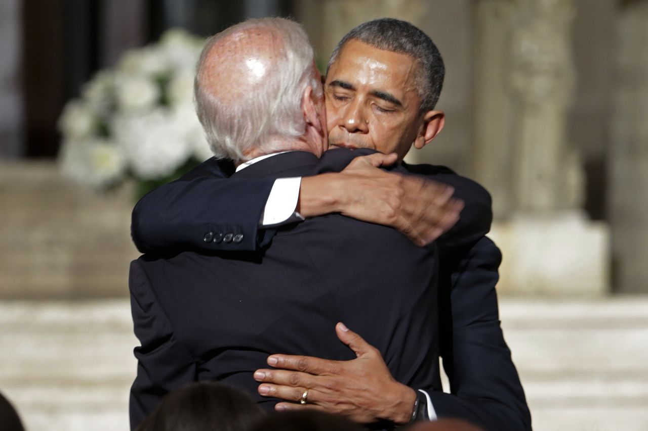 President Barack Obama hugs Joe Biden after delivering the eulogy on June 6. In his eulogy, Obama credited the vice president with inspiring in his son a devotion to public service and to family, jokingly calling him "Joe 2.0." 