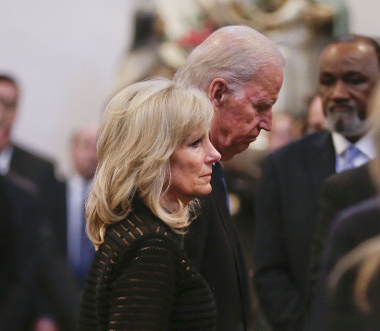 Vice President Joe Biden and his wife, Jill Biden, depart after the service on June 6. 