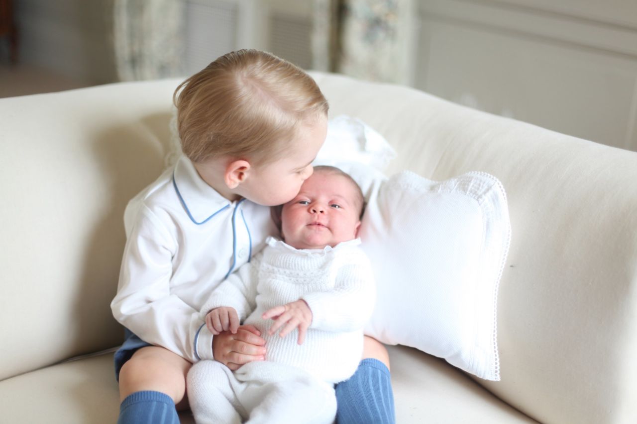 Princess Charlotte is publicly seen with her big brother, Prince George, for the first time in a photo released by Kensington Palace on Saturday, June 6. 