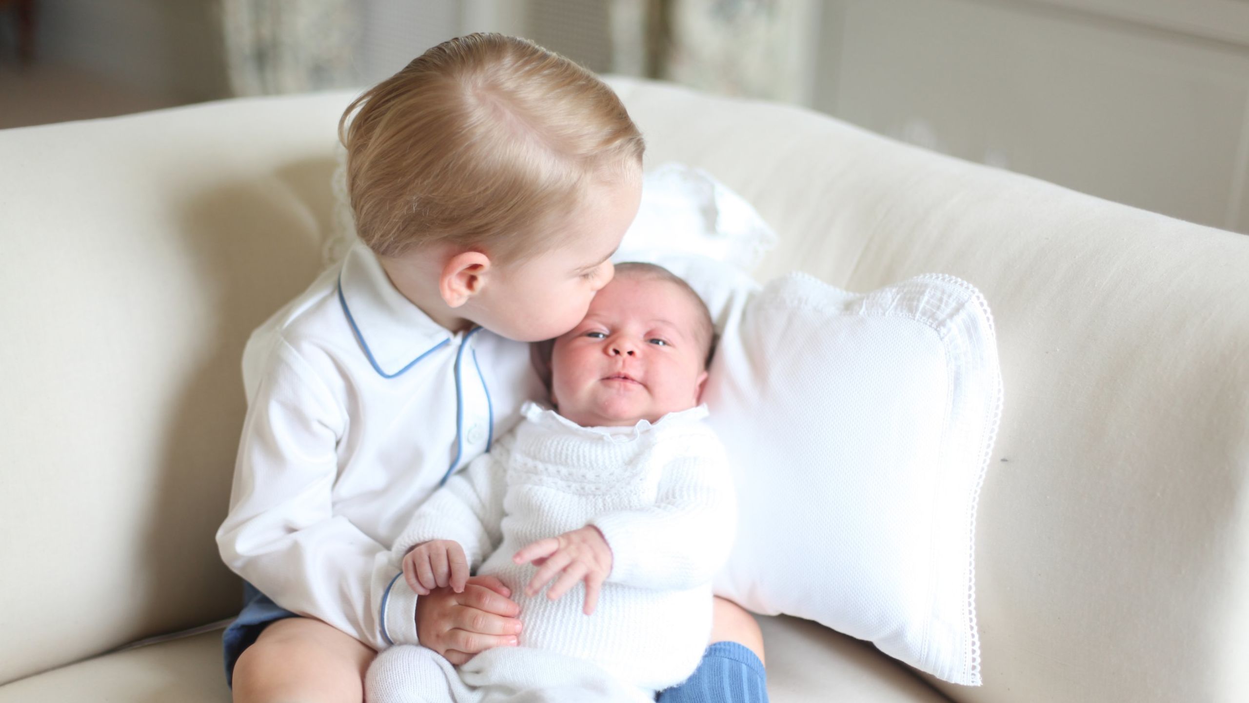 Princess Charlotte is seen with her big brother for the first time in this photo released by Kensington Palace in June 2015.