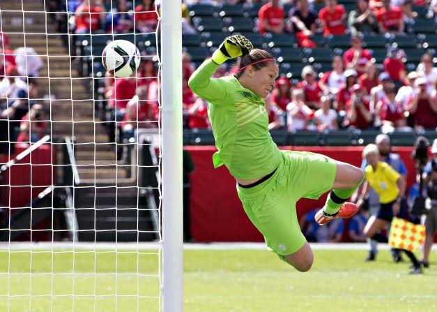 Canadian goalkeeper Erin McLeod makes a save against China in the tournament's opening match Saturday, June 6. The host nation won 1-0 in Edmonton.