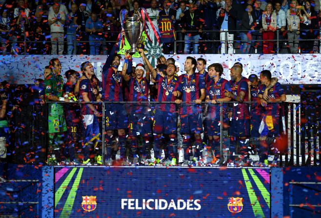 Barcelona players celebrate winning the 2015 Champions League.