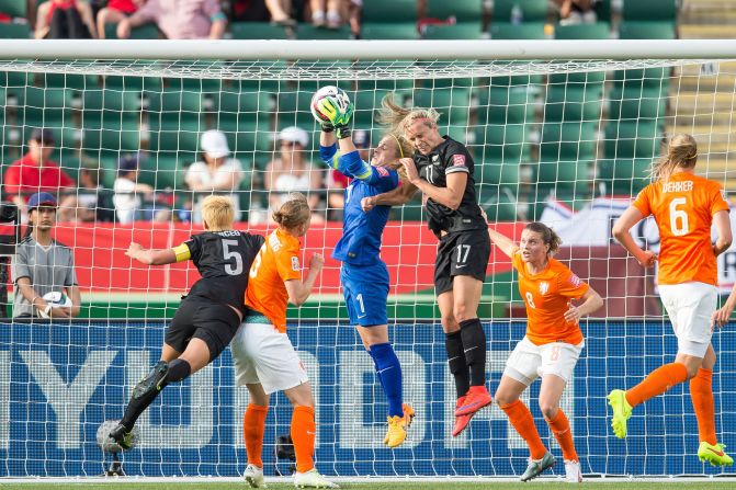 Geurts and New Zealand's Hannah Wilkinson collide.