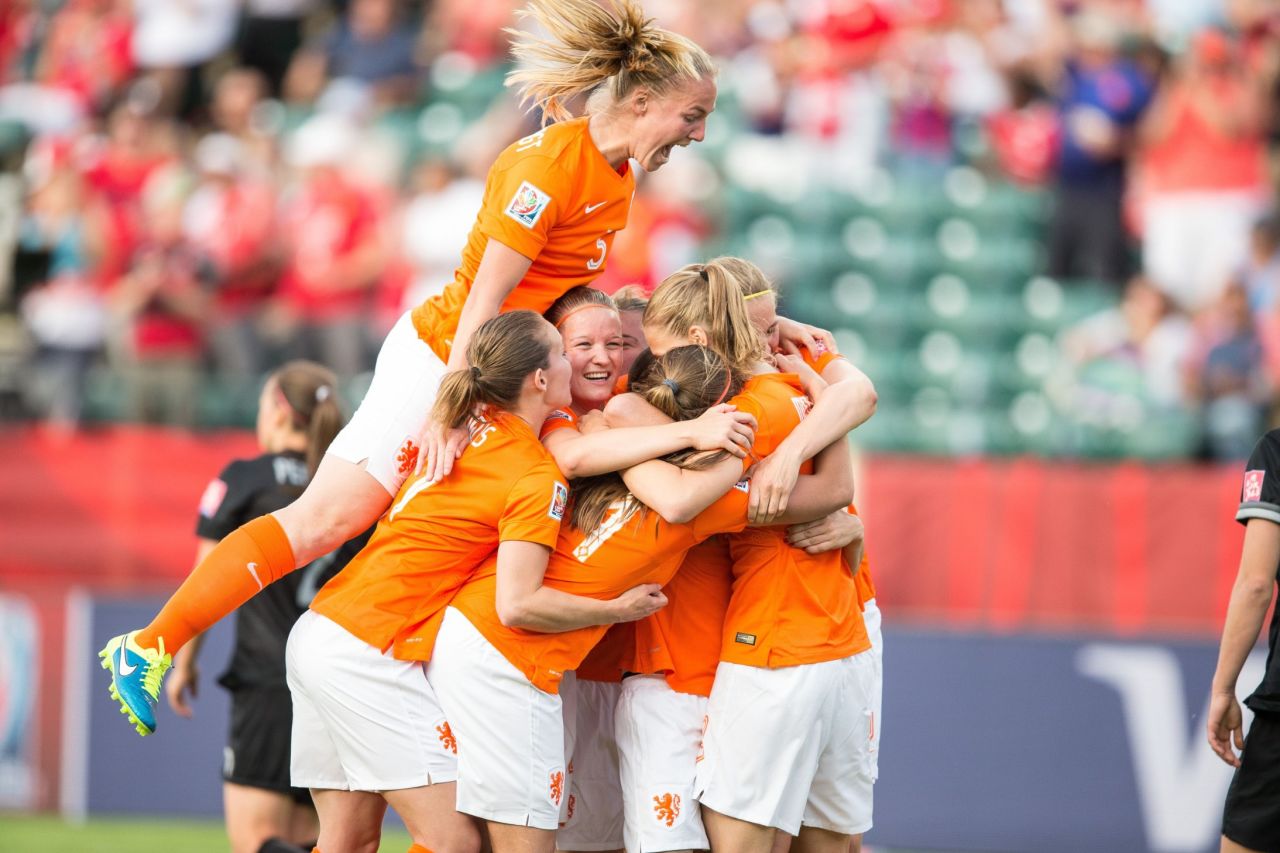 Dutch players celebrate Martens' goal in the first half.
