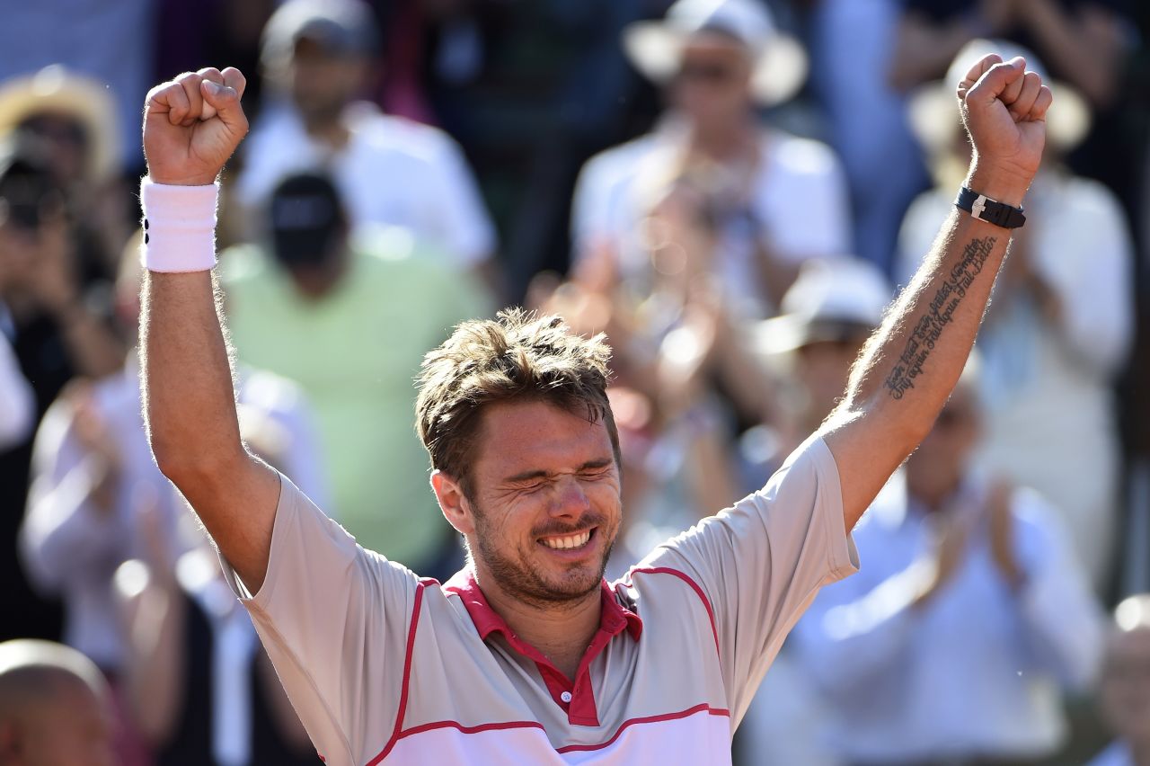 The moment of victory: Stanislas Wawrinka wraps up his epic four-set victory over Novak Djokovic in the final of the French Open.  