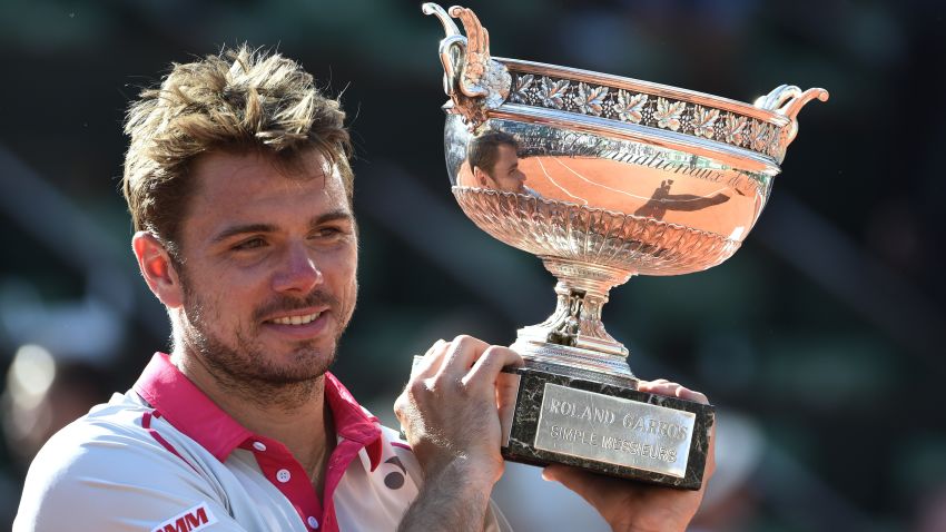 Wawrinka lifts the Coupe des Mousquetaires for the first time as he claims his second grand slam title.