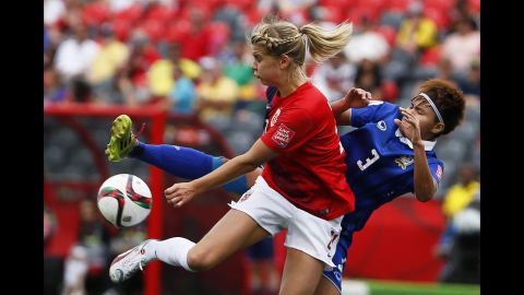 Norway's Ingrid Moe Wold tries to keep Chinwong away from the ball.