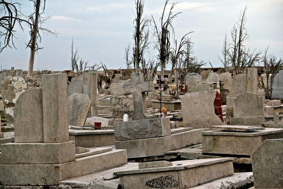 Novak was born in Epecuen and says he'll die there too. Flowers on the cemetery's graves contribute to the sparse colors found in the town.