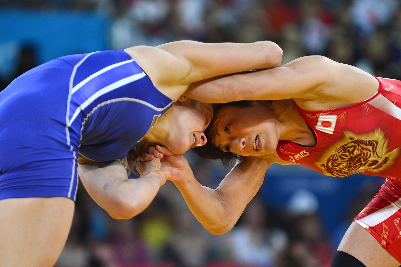 Stadnyk grapples with eventual gold medal winner Hitomi Obara in the final of the 48kg freestyle class in London.
