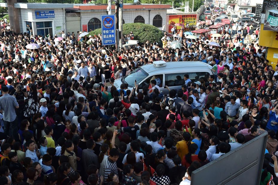 Almost 9.5 million high school students in China took the 2015 gaokao in early June. Failure potentially means no degree and poorer job prospects. In this picture, parents crowd a police car outside Maotanchang High School as students leave to sit the 2015 college entrance exam. 