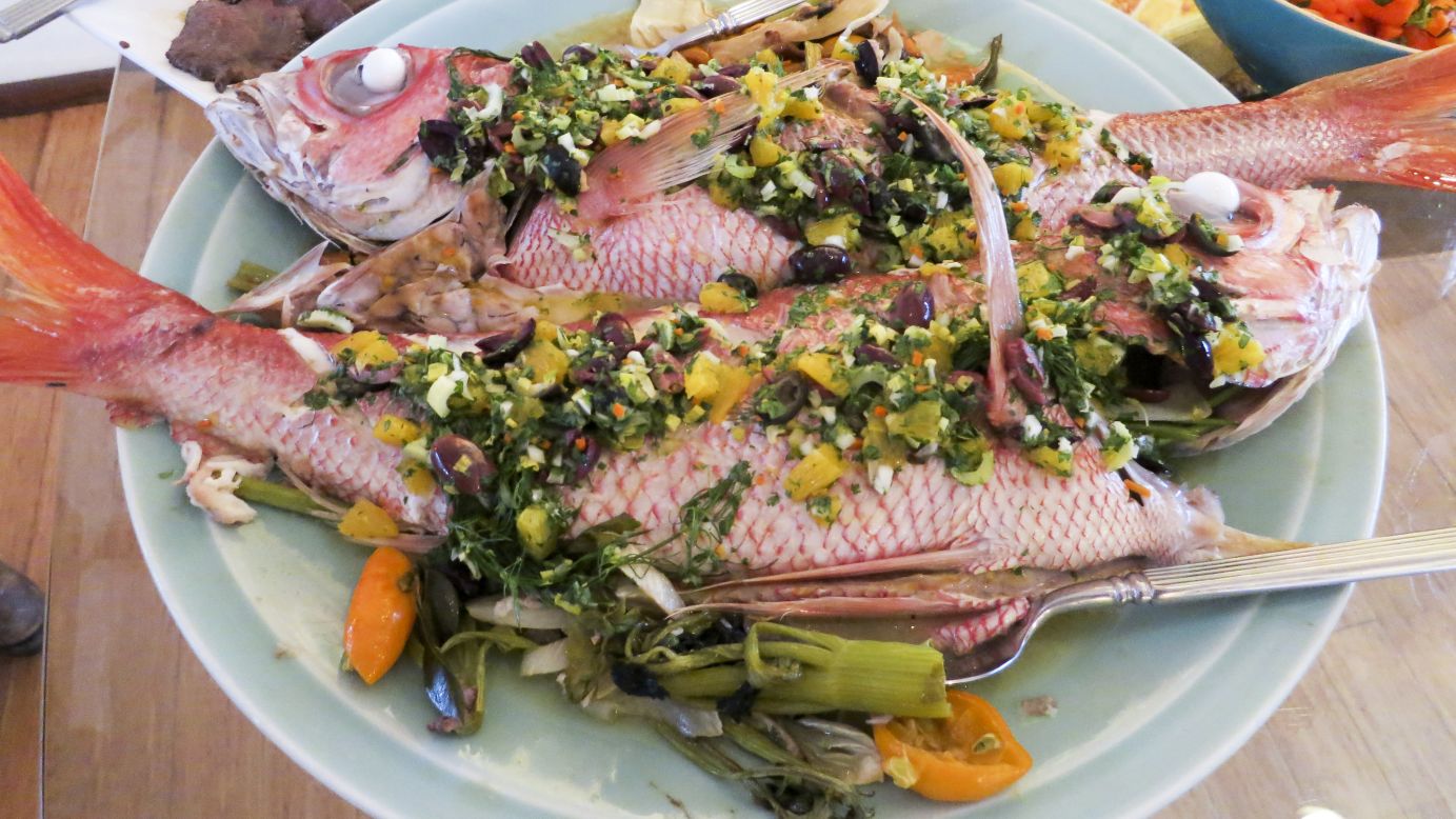 Oven-roasted snapper is also a part of the feast at Gordon's home, along with other types of fresh fish.