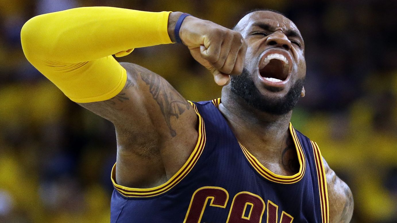 LeBron James pumps his fist after the Cleveland Cavaliers won Game 2 of the NBA Finals on Sunday, June 7. James had a triple-double as the Cavaliers defeated the Golden State Warriors 95-93 and tied the best-of-seven series at one game apiece.