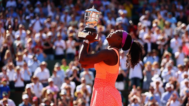 Serena Williams holds up her trophy after <a href="index.php?page=&url=http%3A%2F%2Fwww.cnn.com%2F2015%2F06%2F06%2Fsport%2Ffrench-open-tennis-serena-williams-safarova%2F" target="_blank">winning the French Open</a> on Saturday, June 6. Williams defeated Lucie Safarova in straight sets. This is the third French Open title of her career and her 20th Grand Slam title. Only Steffi Graf has won more major titles in the Open era (22).