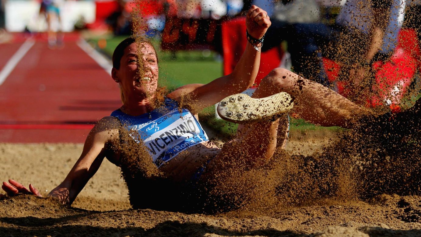 Italian long jumper Tania Vicenzino lands in the sand pit Thursday, June 4, while competing in the Golden Gala track meet in Rome.