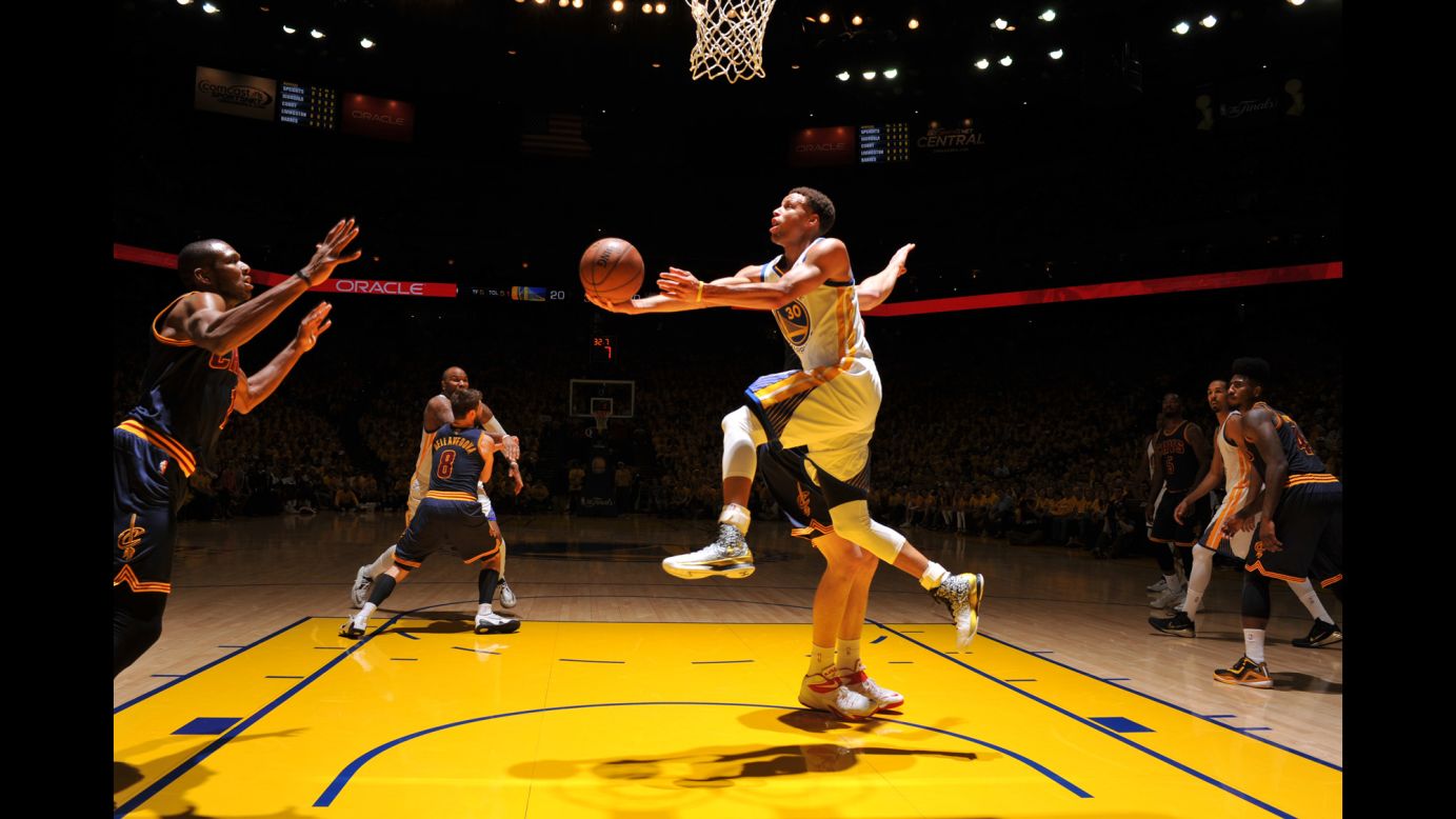 Golden State guard Stephen Curry drives to the basket during Game 2 of the NBA Finals on Sunday, June 7. Curry, the league's Most Valuable Player this season, had a nightmare shooting night. He went just 5-for-23 from the field as the Warriors lost to the Cleveland Cavaliers 95-93.