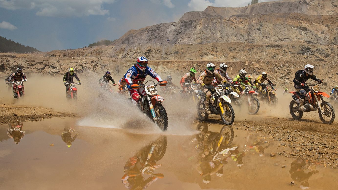 Dirt bike racers compete in the Red Bull Hare Scramble, an off-road endurance race in Austria, on Sunday, June 7.