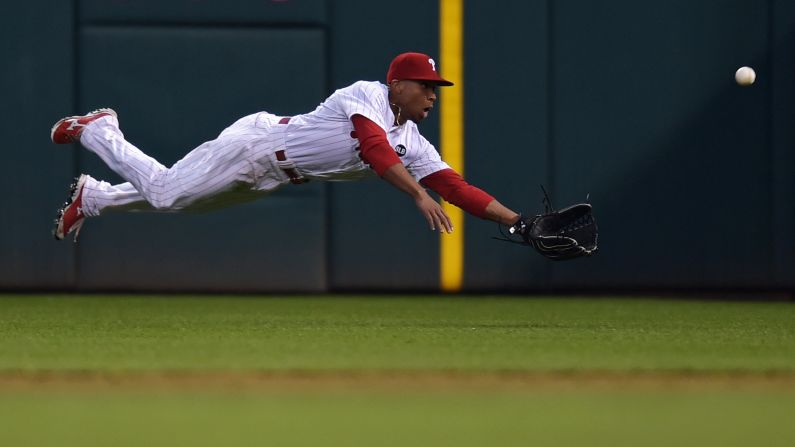 Philadelphia's Ben Revere dives for a ball during a home game against Cincinnati on Tuesday, June 2.