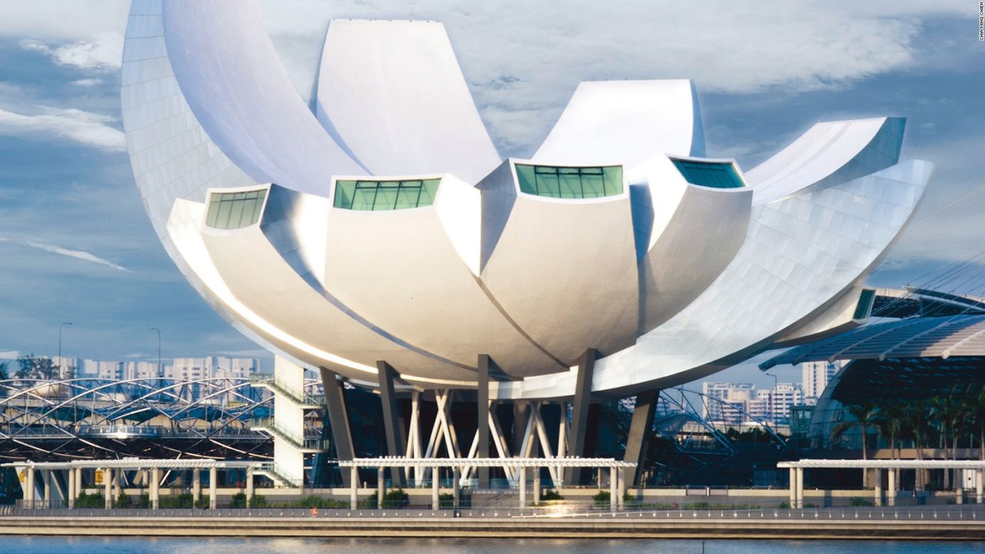 The lotus-inspired ArtScience museum, opened in 2011, is another design by Moshe Safdie.<br /><br />Ten "fingers" extend from the base at the middle with skylights at the end of each providing sustainable light inside the exhibition space. The curved shape also enables rainwater harvesting as water is collected into a pond at the base of the building. 