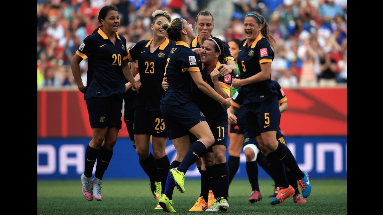 Australia's Lisa De Vanna celebrates her first-half goal with her teammates.