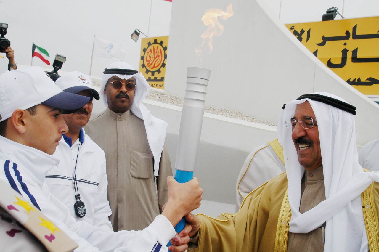 In March 2005 Sheikh Sabah al-Ahmad al-Sabah (R) held a torch declaring the inauguration of the international Jaber al-Ahmad al-Sabah stadium in Ardeyya, South of Kuwait City.