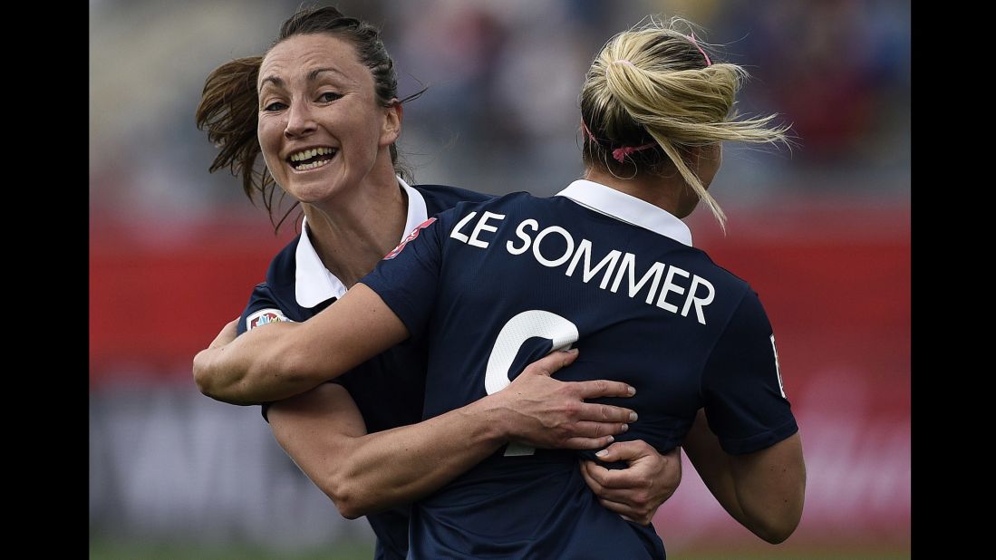 French forward Eugenie Le Sommer is congratulated by teammate Gaetane Thiney after scoring the game's only goal.