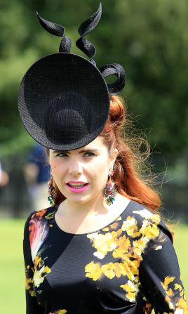 British singer Paloma Faith wears a fascinator -- a style of formal headwear -- which has formed a key part of racetrack fashion over the years.