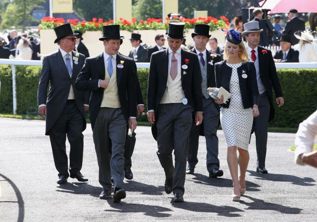 Prince Harry (second left) and Jake Warren (third left) are among a group arriving at Ascot in 2014 wearing the traditional morning suit and top hat associated with major events at the racecourse.