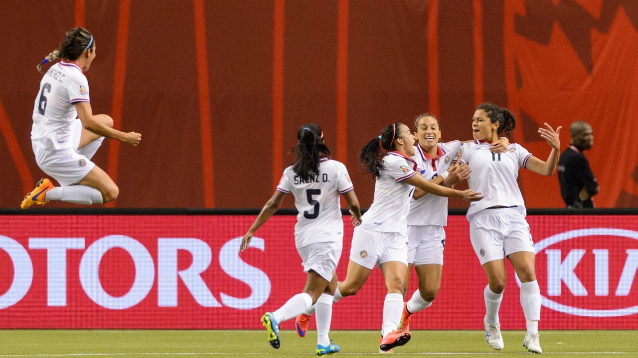 Raquel Rodriguez Cedeno, right, celebrates her goal with her Costa Rican teammates. 