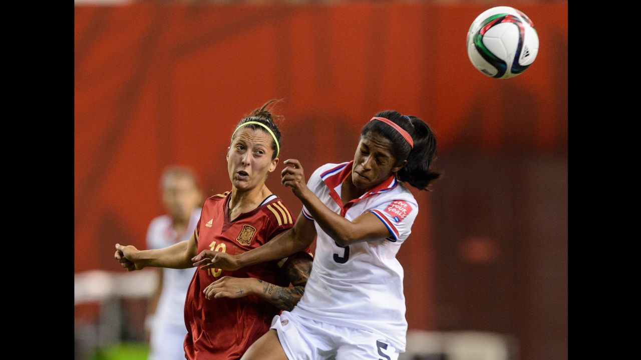 Spain's Jennifer Hermoso watches Costa Rica's Diana Saenz head the ball.
