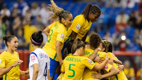 Brazilian players celebrate a goal scored by Marta during their match against South Korea on Tuesday, June 9. Brazil won the match 2-0 in Montreal.