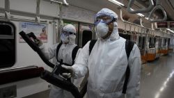 GOYANG, SOUTH KOREA - JUNE 09: Disinfection workers wearing protective gears spray anti-septic solution in an subway amid rising public concerns over the spread of MERS virus at Seoul metro railway base on June 9, 2015 in Goyang, South Korea. South Korea has reported eighth death, 2,892 quarantined, and 1800 schools closed as of June 9, 2015. (Photo by Chung Sung-Jun/Getty Images)