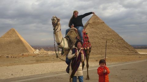 U.S. tourist Brian Wahl couldn't resist having this photo taken at the pyramids in Giza January this year. He moved to the country with his family due to his wife's job, and has been loving the experience. "Even though we have lived in Alexandria for half a year, there is still not a day that I don't hear someone welcoming me," he says. http://ireport.cnn.com/docs/DOC-1247355 
