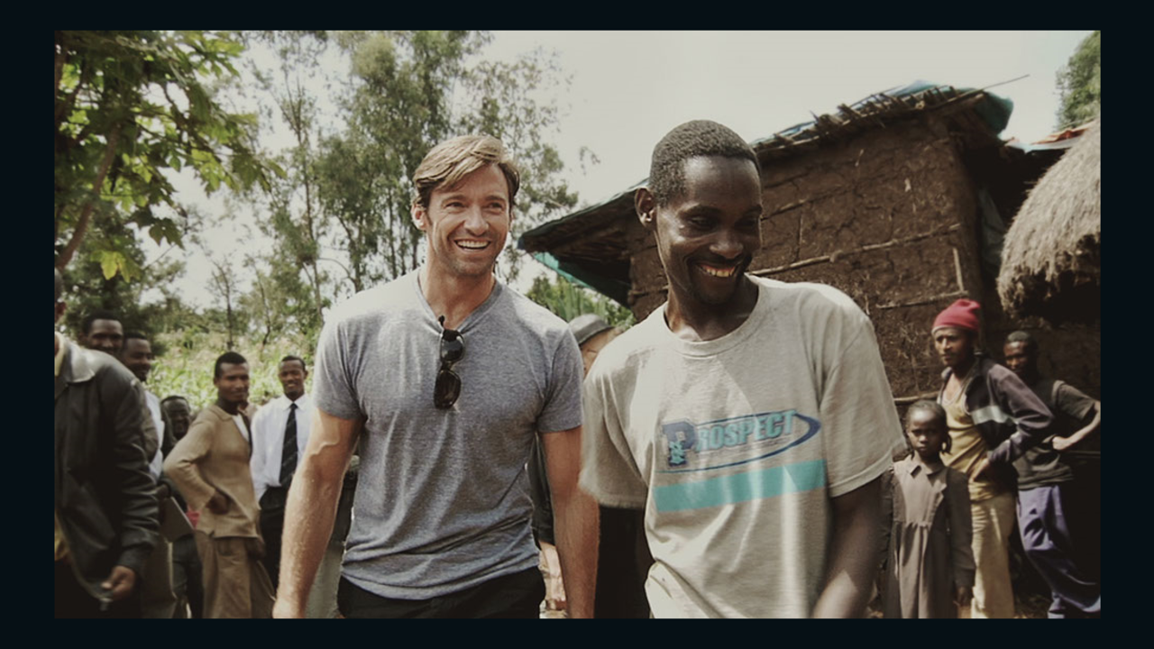 Hugh Jackman and his new found friend, Ethiopian coffee farmer Dukale, outside of  Dukale's Yirgacheffe home.