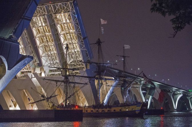 It's a replica of the French frigate 'L'Hermione," the ship that brought General Lafayette to the United States in 1780 to rally the American rebels against the English Crown. Here, it can be seen passing through the Woodrow Wilson Draw Bridge near Alexandria, Virginia.