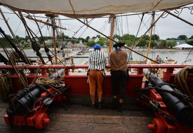 Two Hermione sailors look at the port after the official arrival ceremony at Yorktown, Virginia.