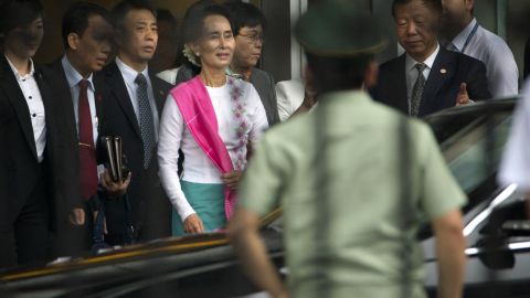 Myanmar's opposition leader Aung San Suu Kyi arrives at Beijing Capital International Airport.