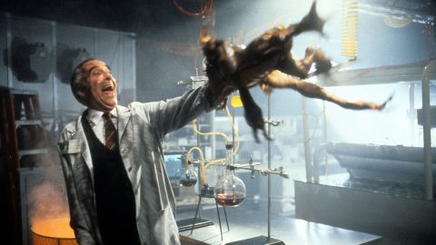 Lee tries to throw a gremlin off his arm in the 1990 film "Gremlins 2: The New Batch."