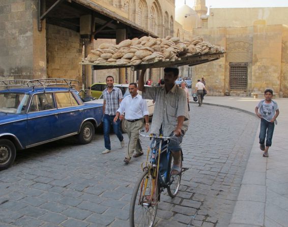 Swiss resident <a href="index.php?page=&url=http%3A%2F%2Fireport.cnn.com%2Fdocs%2FDOC-1247707">Helen Nyman</a> loved the precarious balancing act this breadseller was pulling off near Cairo's old  Khan el-Khalili Bazar. 