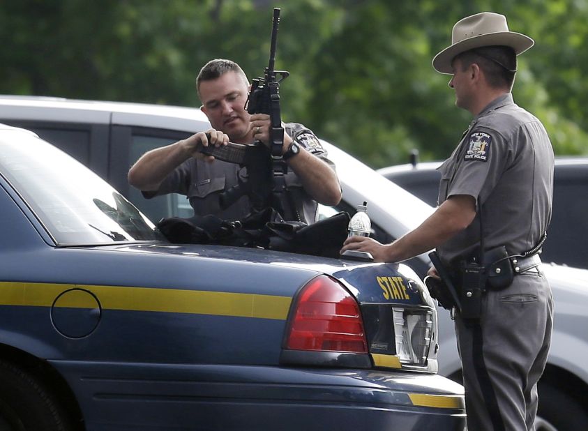 New York State Police prepare equipment during the search on Thursday, June 11. 