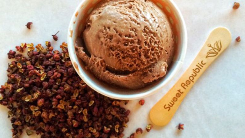 Taste buds tingle to Sichuan chocolate ice cream at Sweet Republic. The chocolate ice cream with Sichuan peppercorns and orange zest is recommended pairing with a scoop of the habanera bacon avocado.