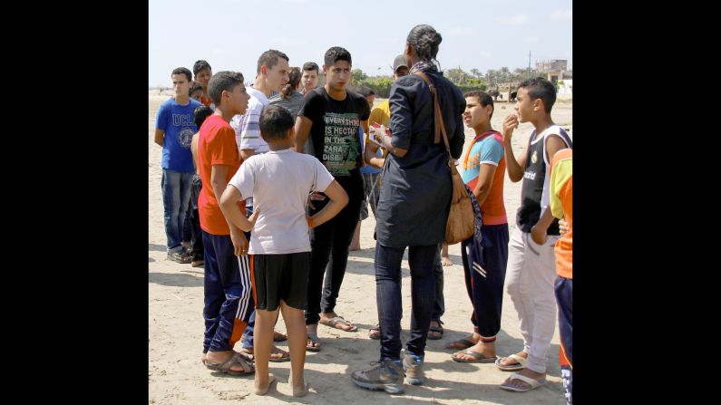 Elbagir talks to 17-year-old Talal. He went to Italy on a smuggler boat last year, but he decided life there was too difficult and came back voluntarily.