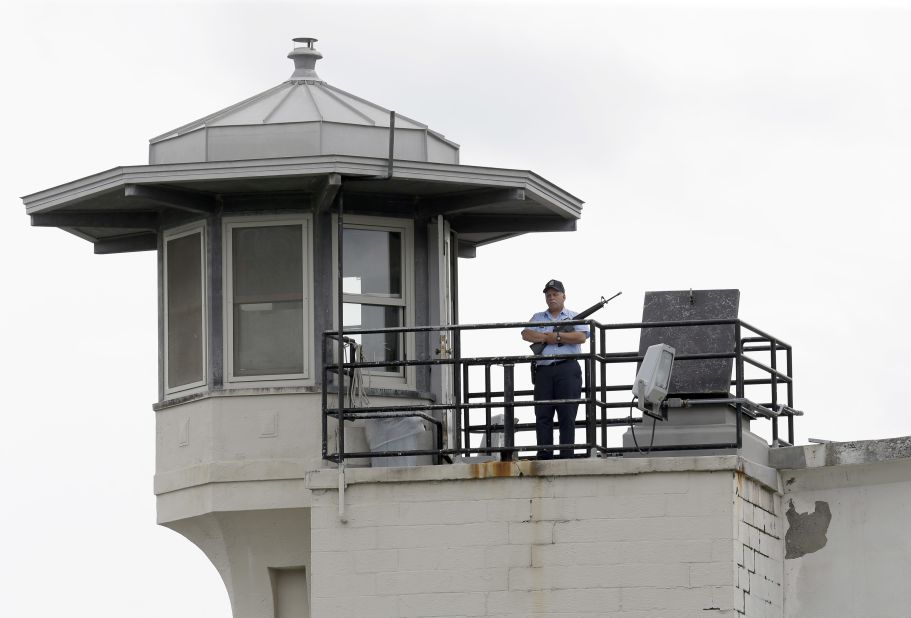 An employee stands guard at the Clinton Correctional Facility on June 10.